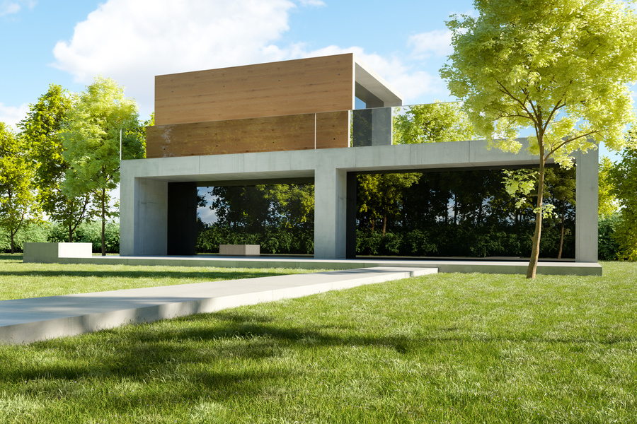 Modern concrete house with garden